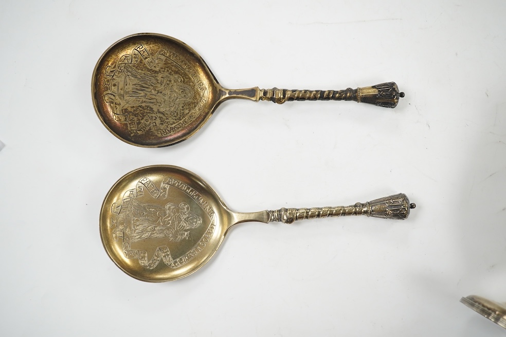 A George V silver sugar caster, by Harrod's Ltd, Sheffield, 1912, 18.4cm and a pair of Victorian commemorative spoons, Edward Pairpoint, London, 1878. Condition - fair to good.